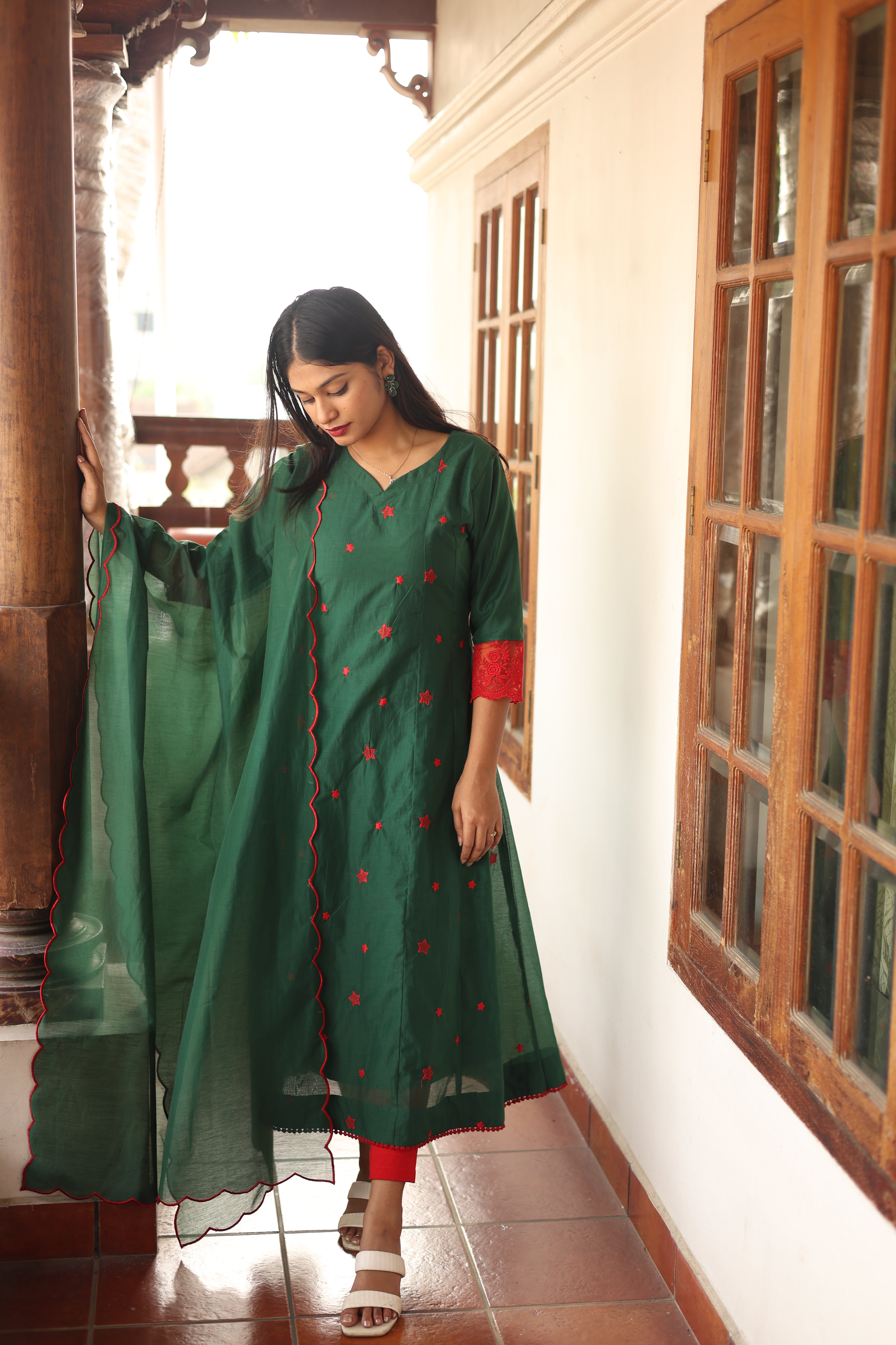 Mul Chanderi Kurti only with Embroidered Panels & Lace-Bottle Green.