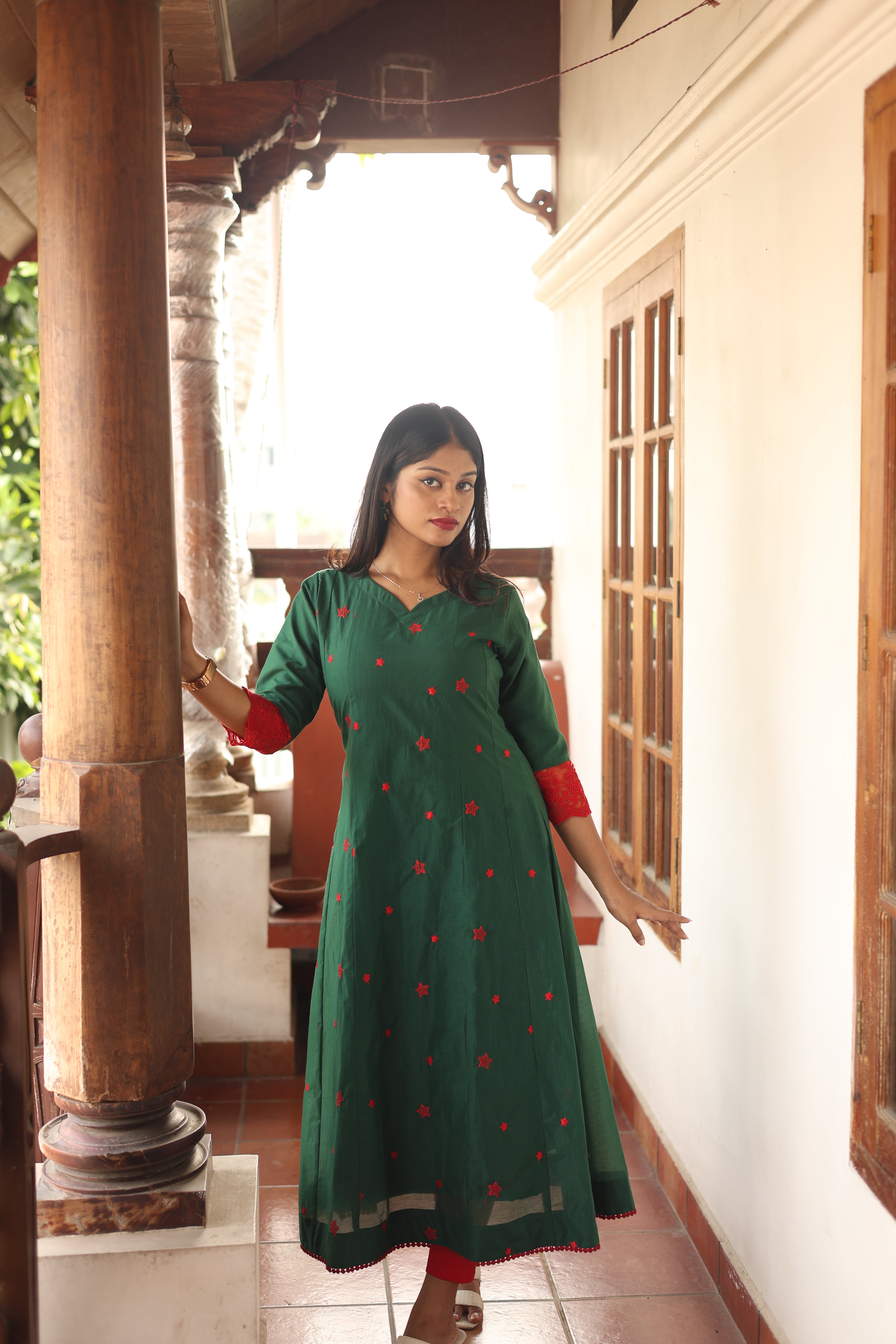 Mul Chanderi Kurti only with Embroidered Panels & Lace-Bottle Green.