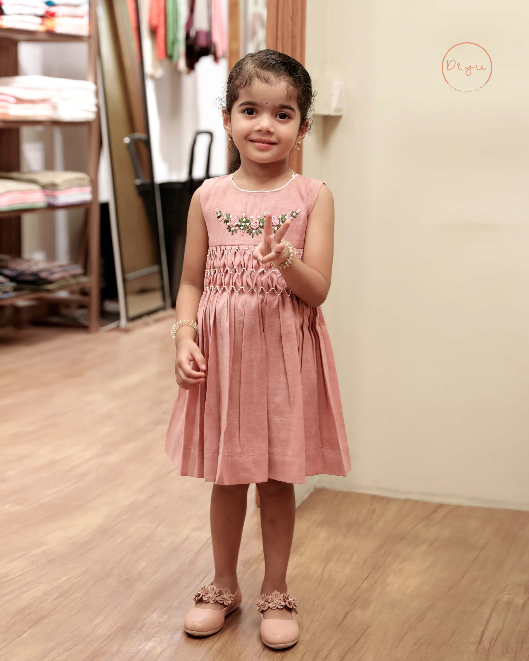 Kids Frock with smocking and hand embroidery