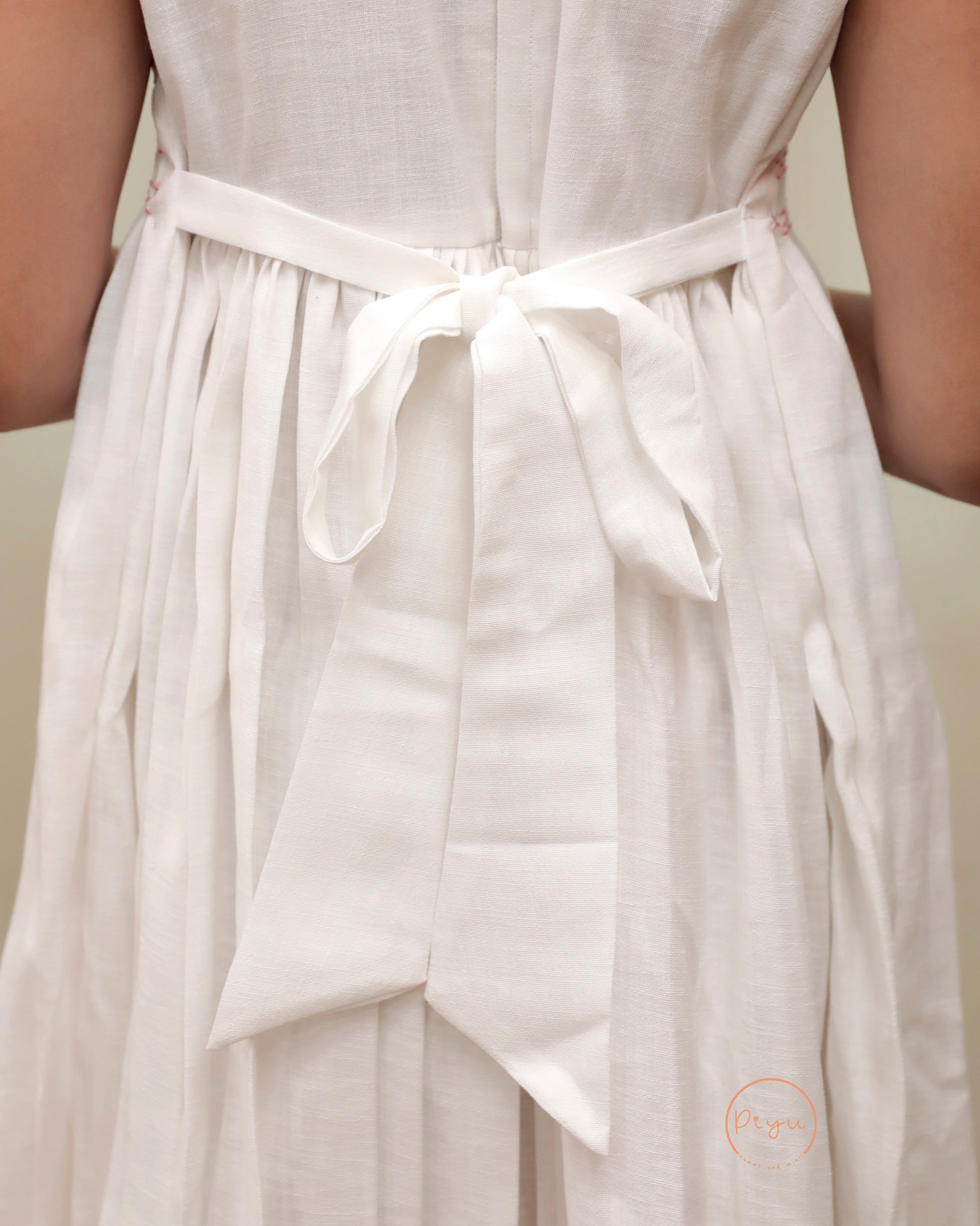 Kids Frock with smocking and hand embroidery