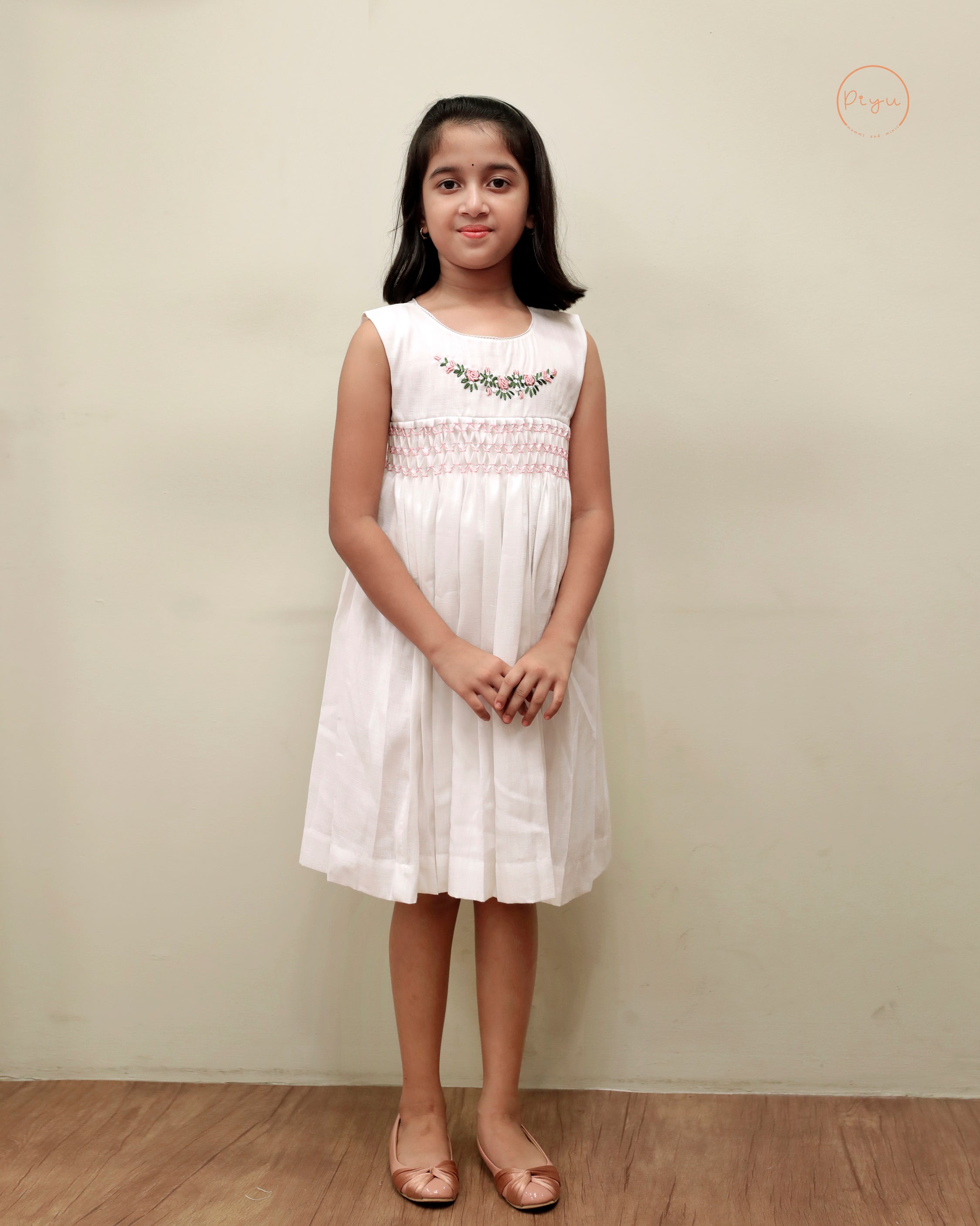 Kids Frock with smocking and hand embroidery
