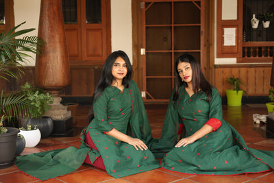 Mul Chanderi Kurti only with Embroidered Panels & Lace-Bottle Green.