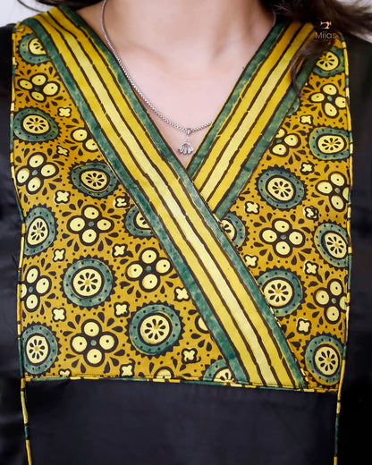 Modal Silk Kurti: Vibrant Contrast Print & Luxurious Drape-Black.