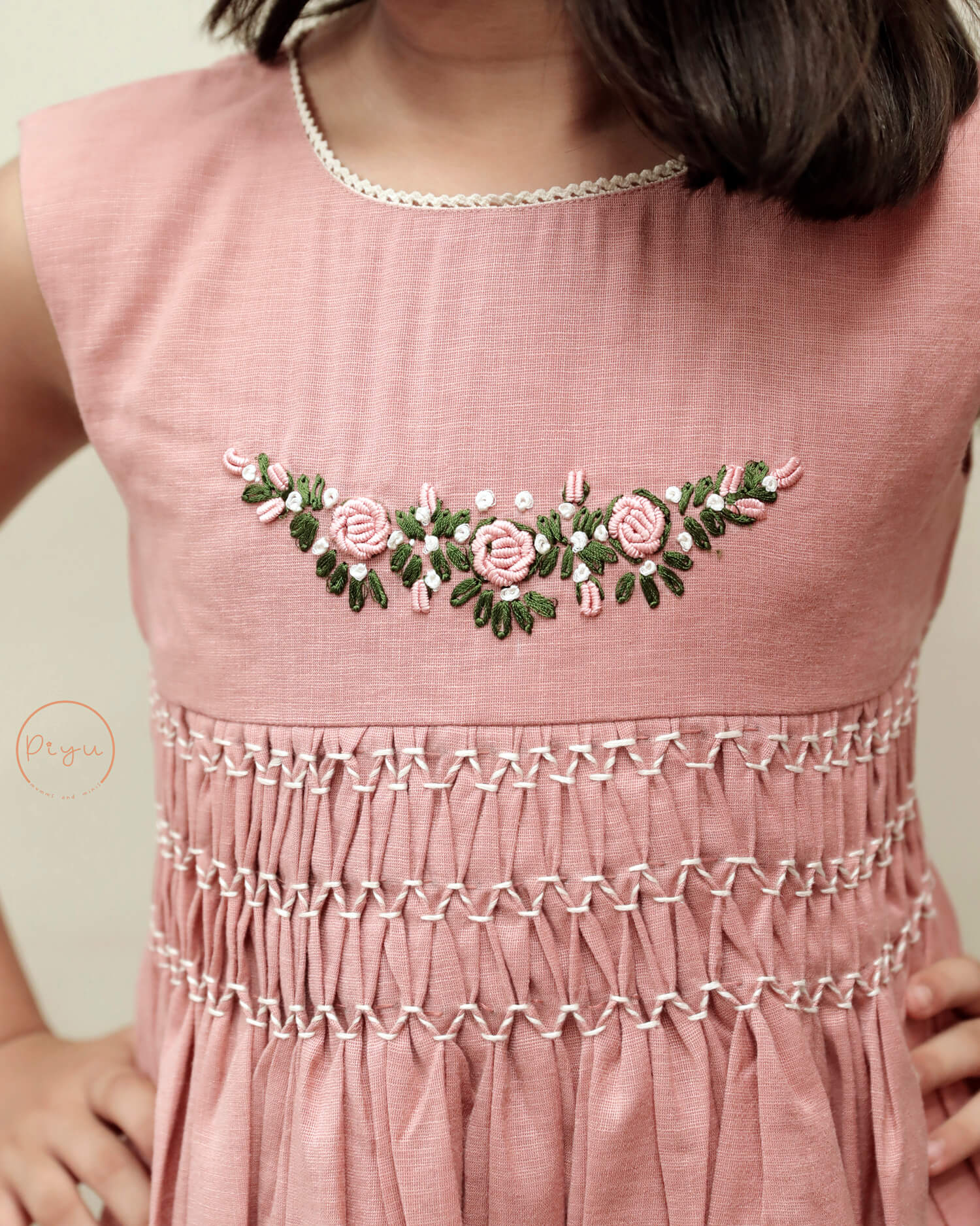 Kids Frock with smocking and hand embroidery
