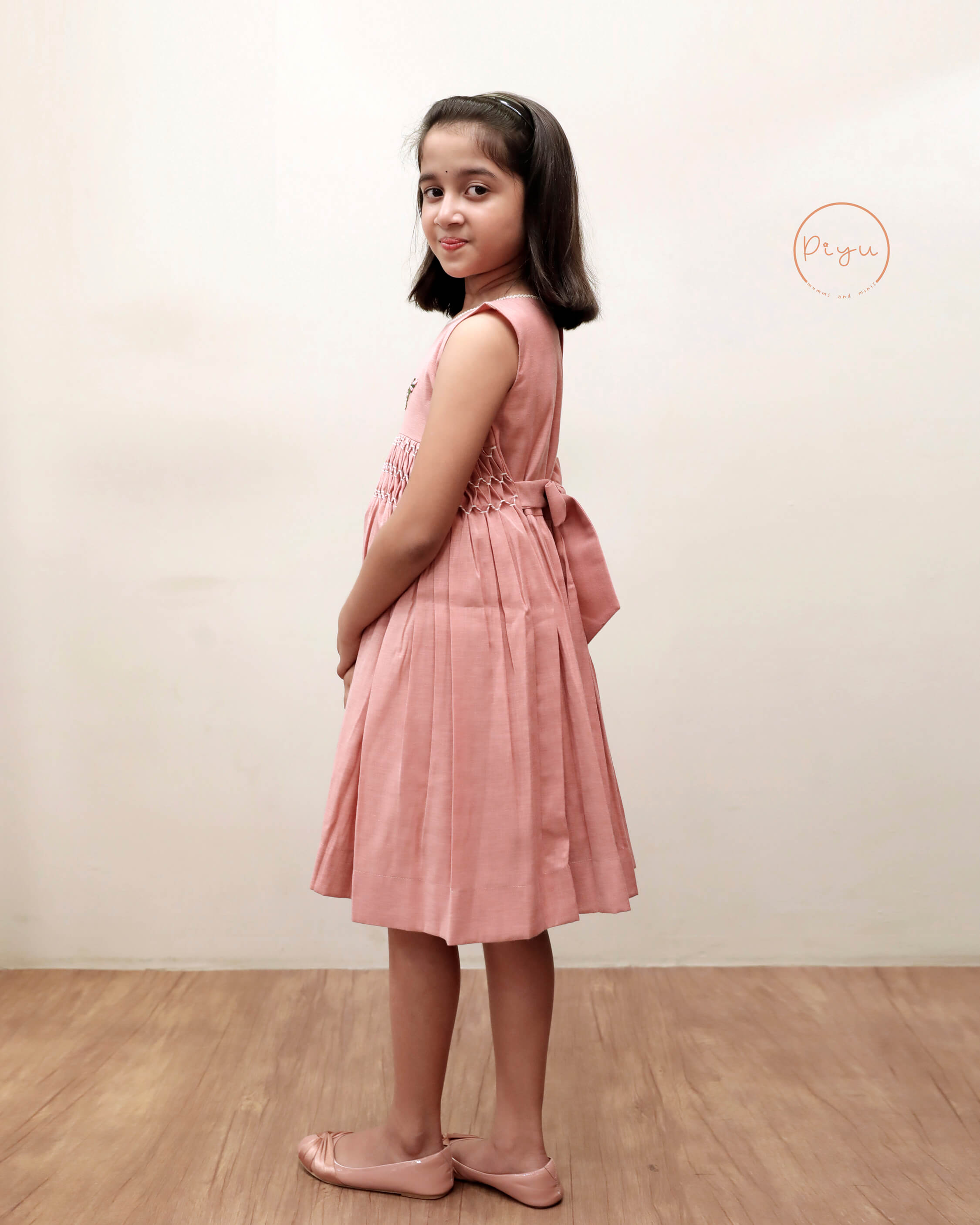 Kids Frock with smocking and hand embroidery