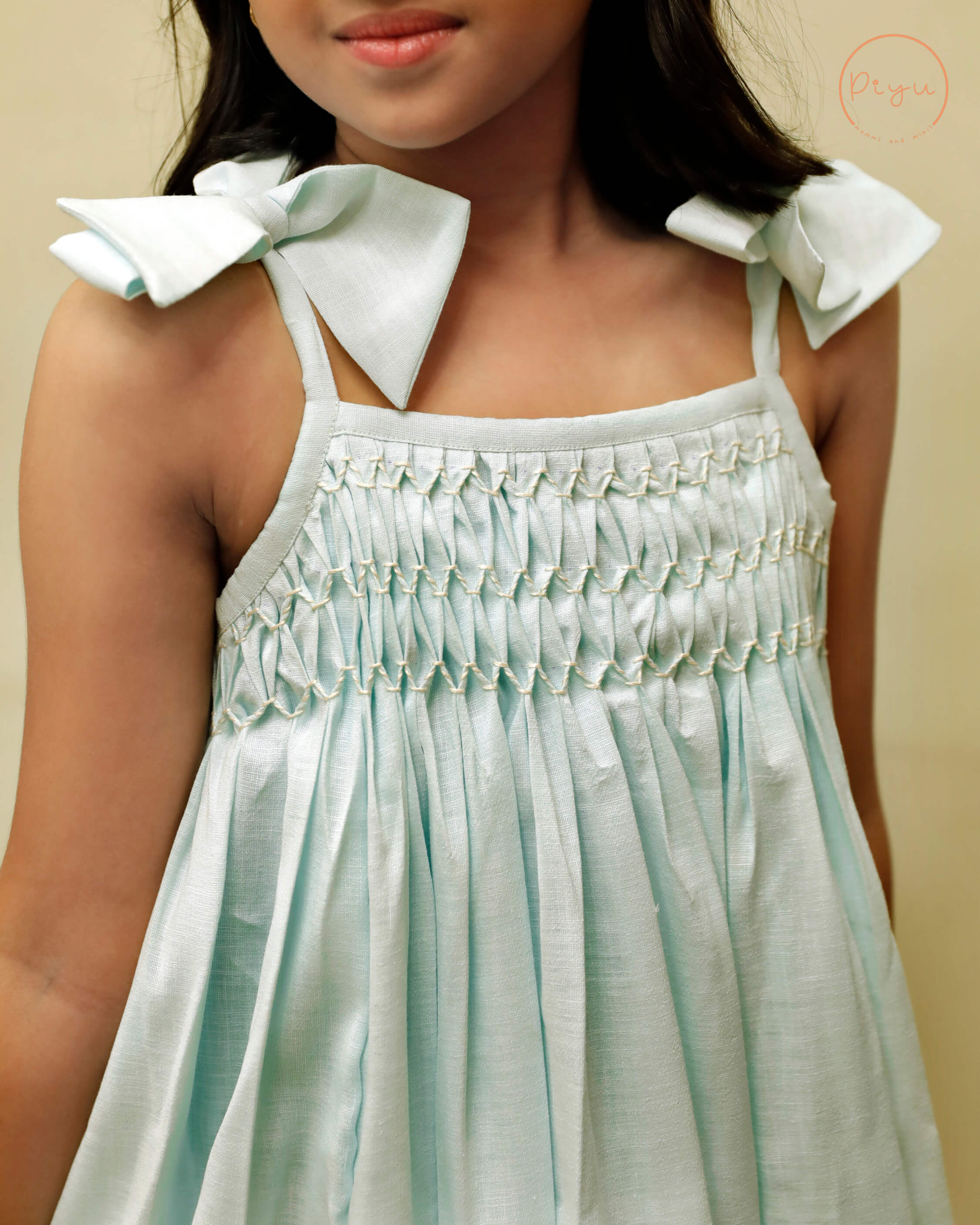 Smocked Kid's frock in soft linen cotton