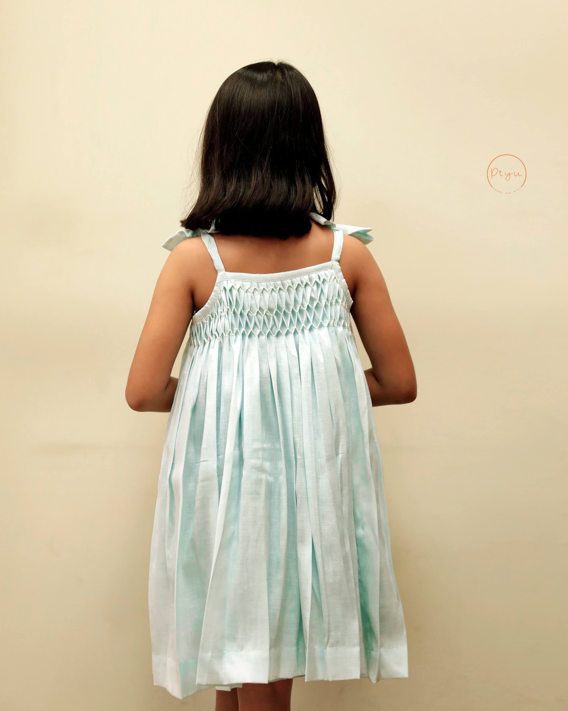 Smocked Kid's frock in soft linen cotton