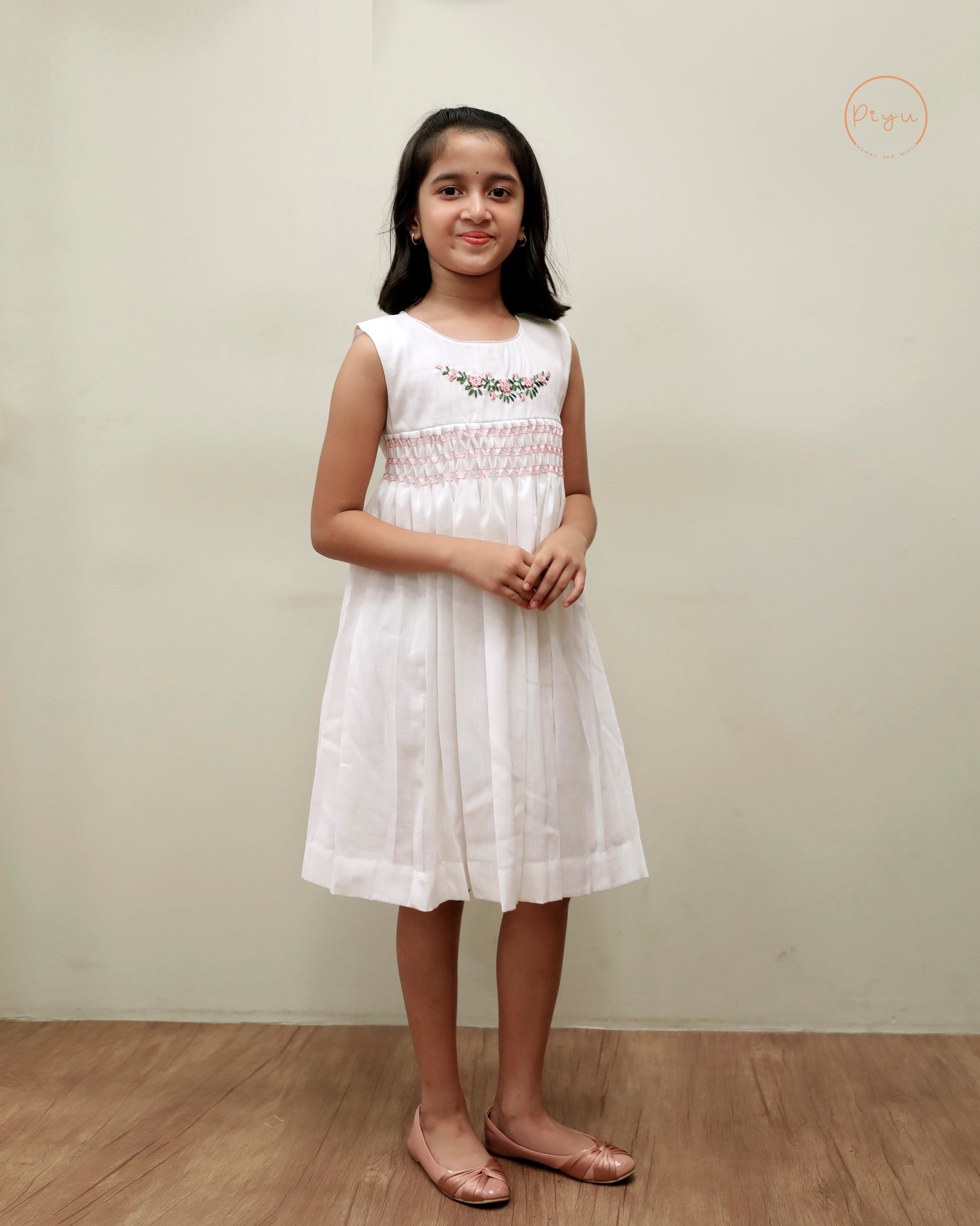 Kids Frock with smocking and hand embroidery