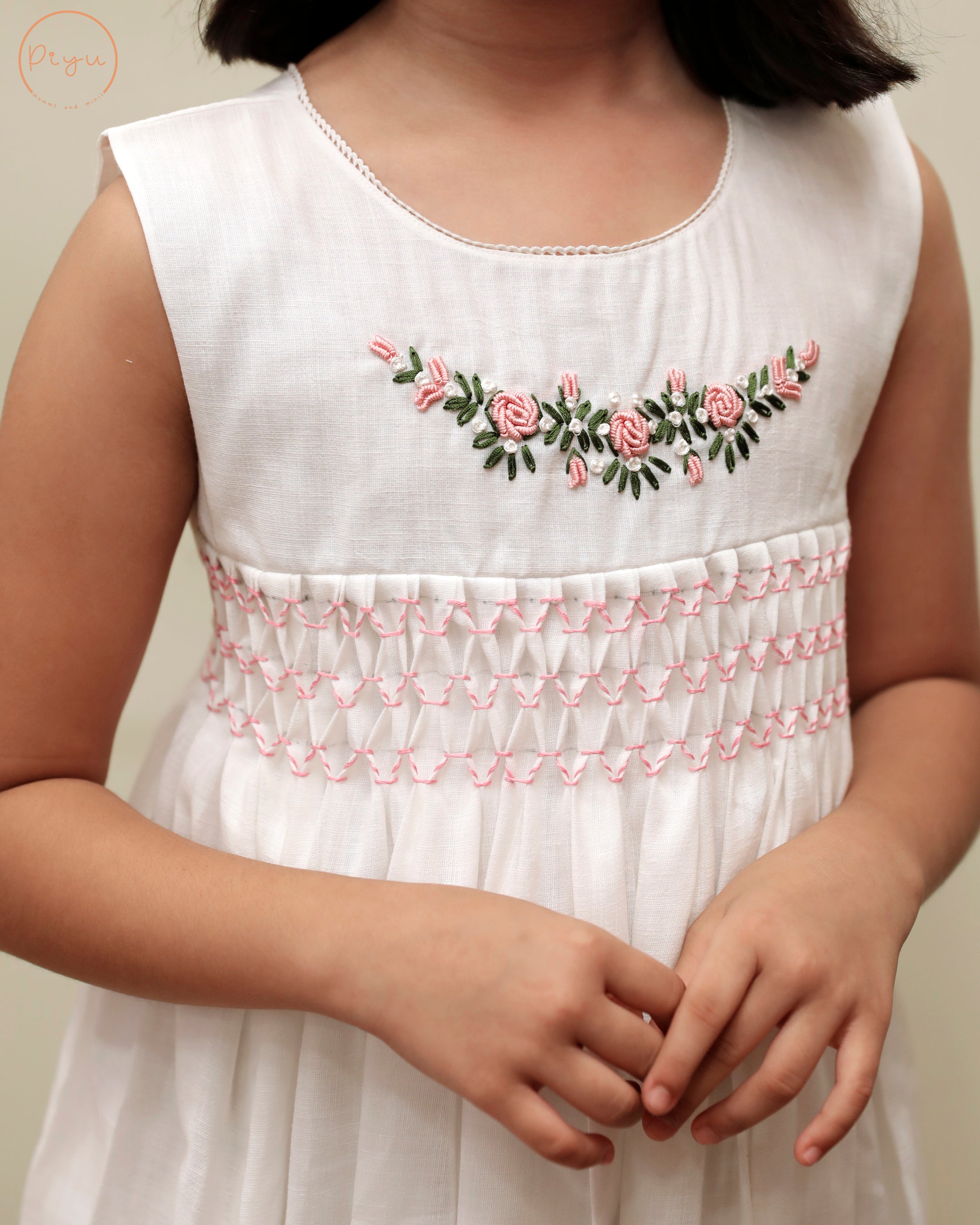 Kids Frock with smocking and hand embroidery