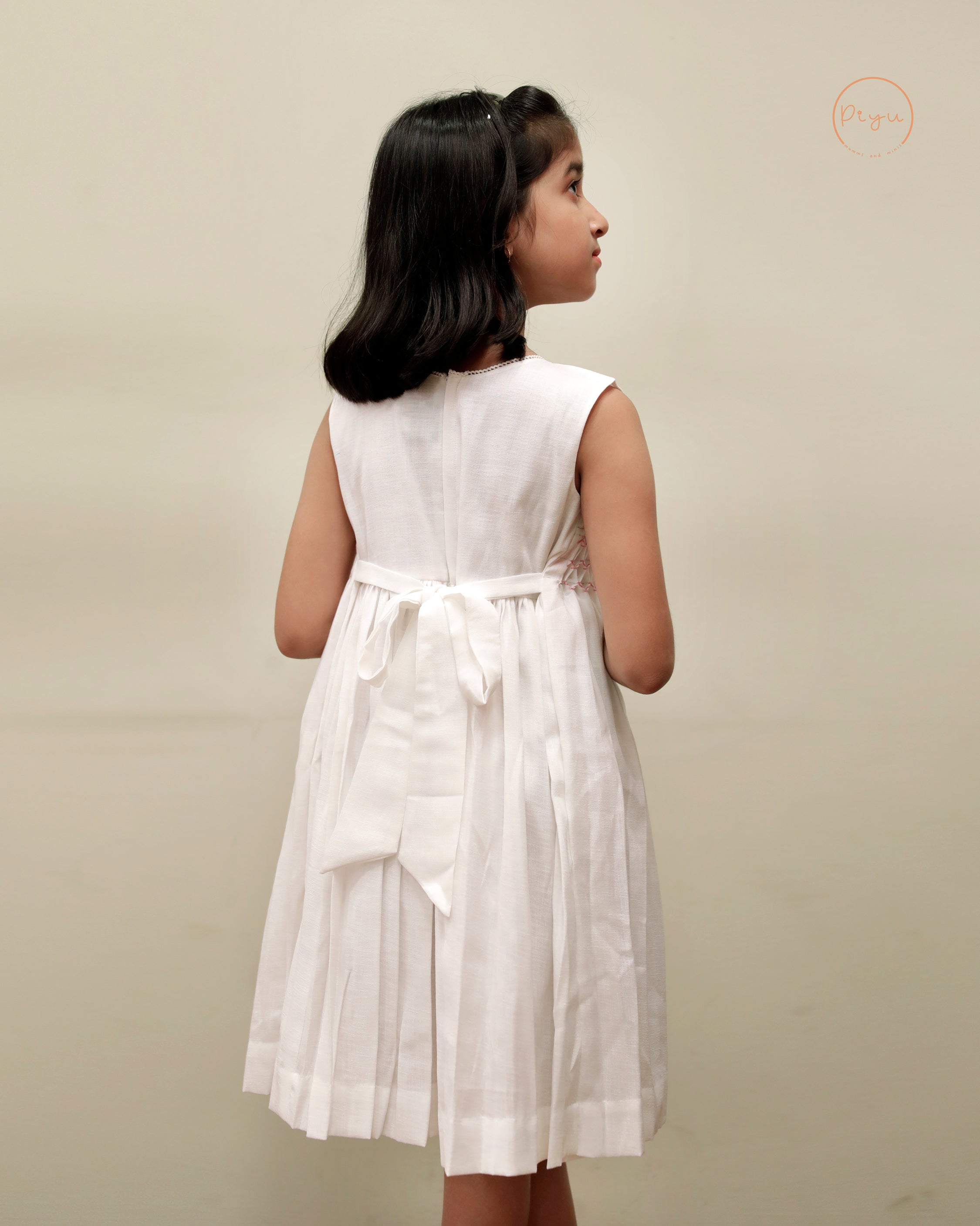 Kids Frock with smocking and hand embroidery