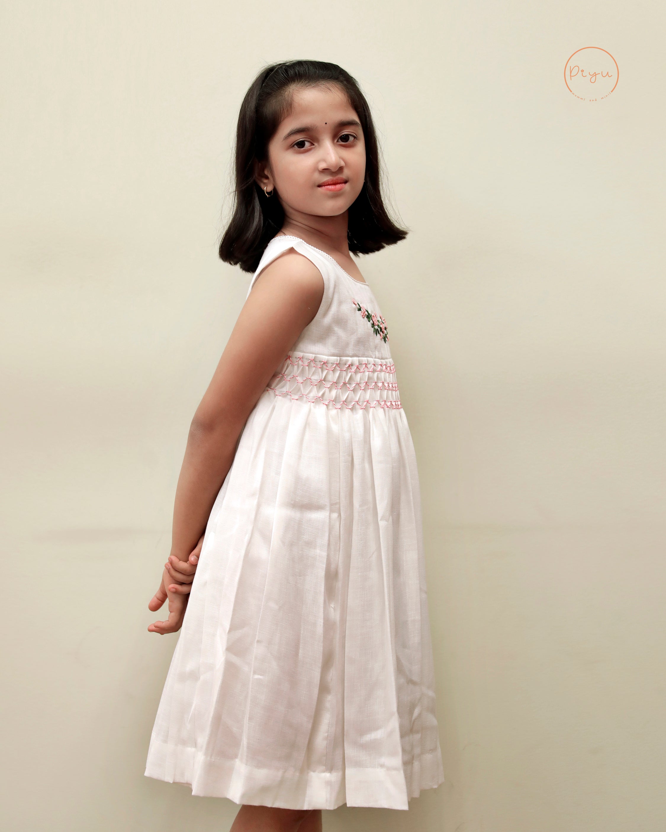 Kids Frock with smocking and hand embroidery