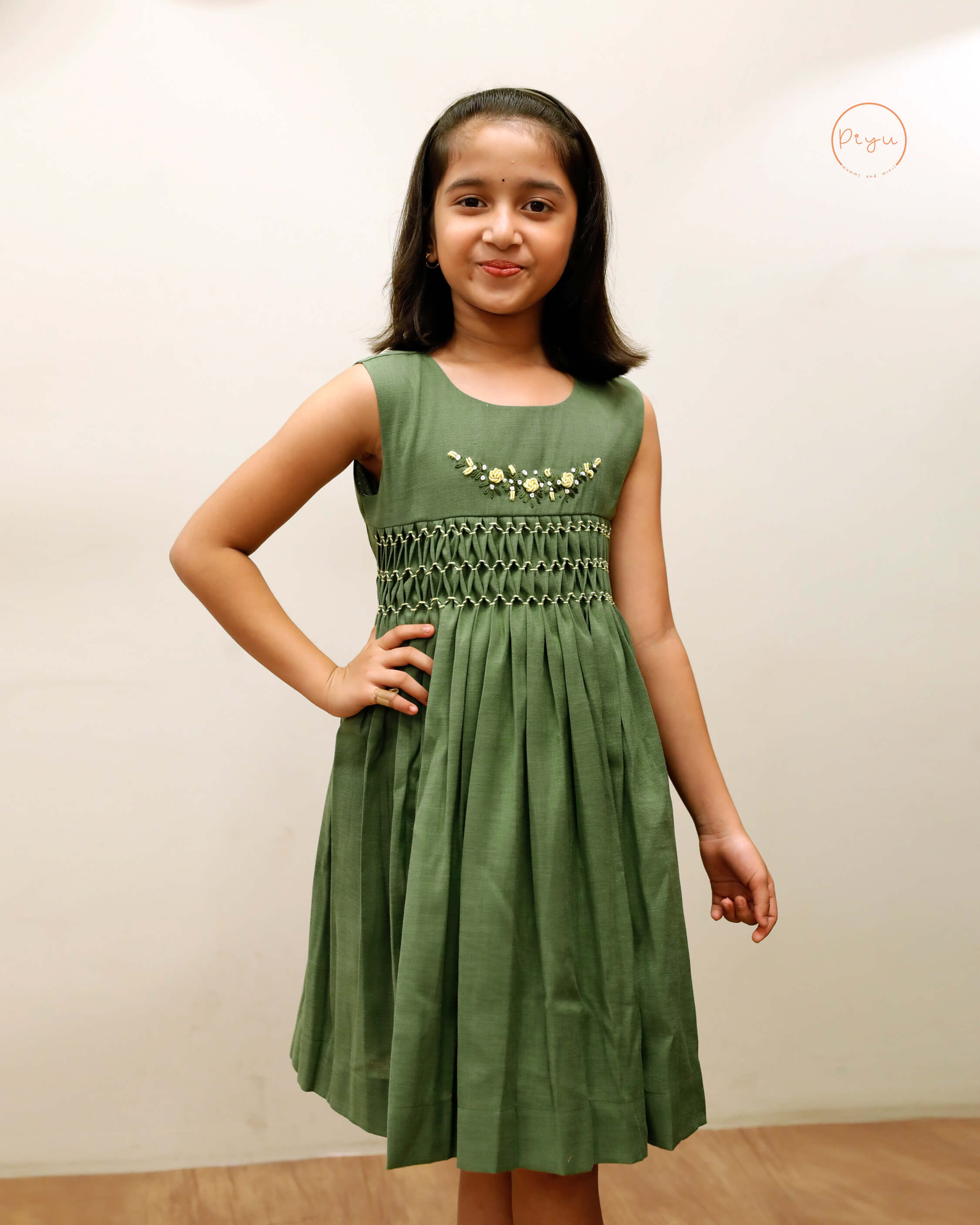 Kids Frock with smocking and hand embroidery