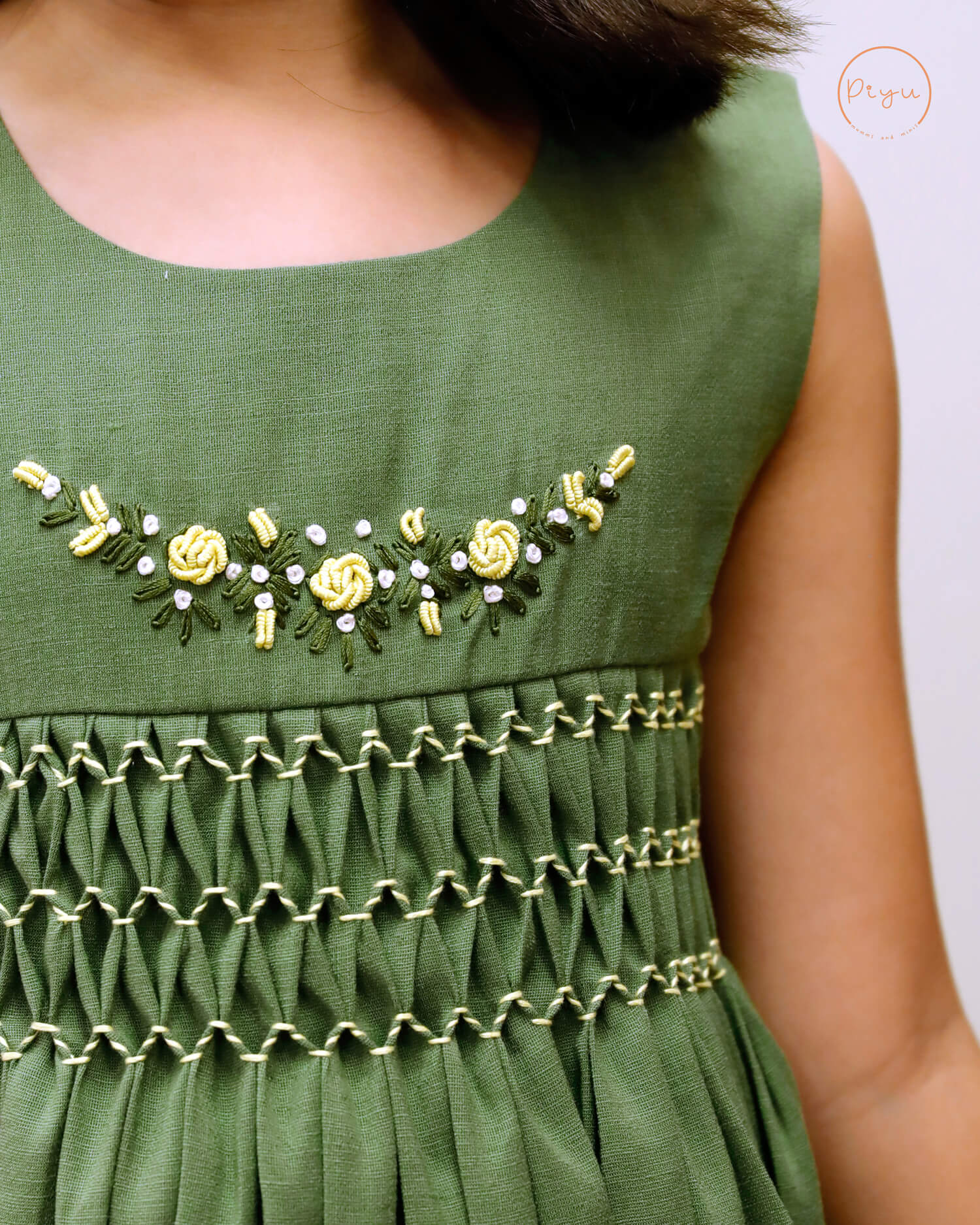 Kids Frock with smocking and hand embroidery