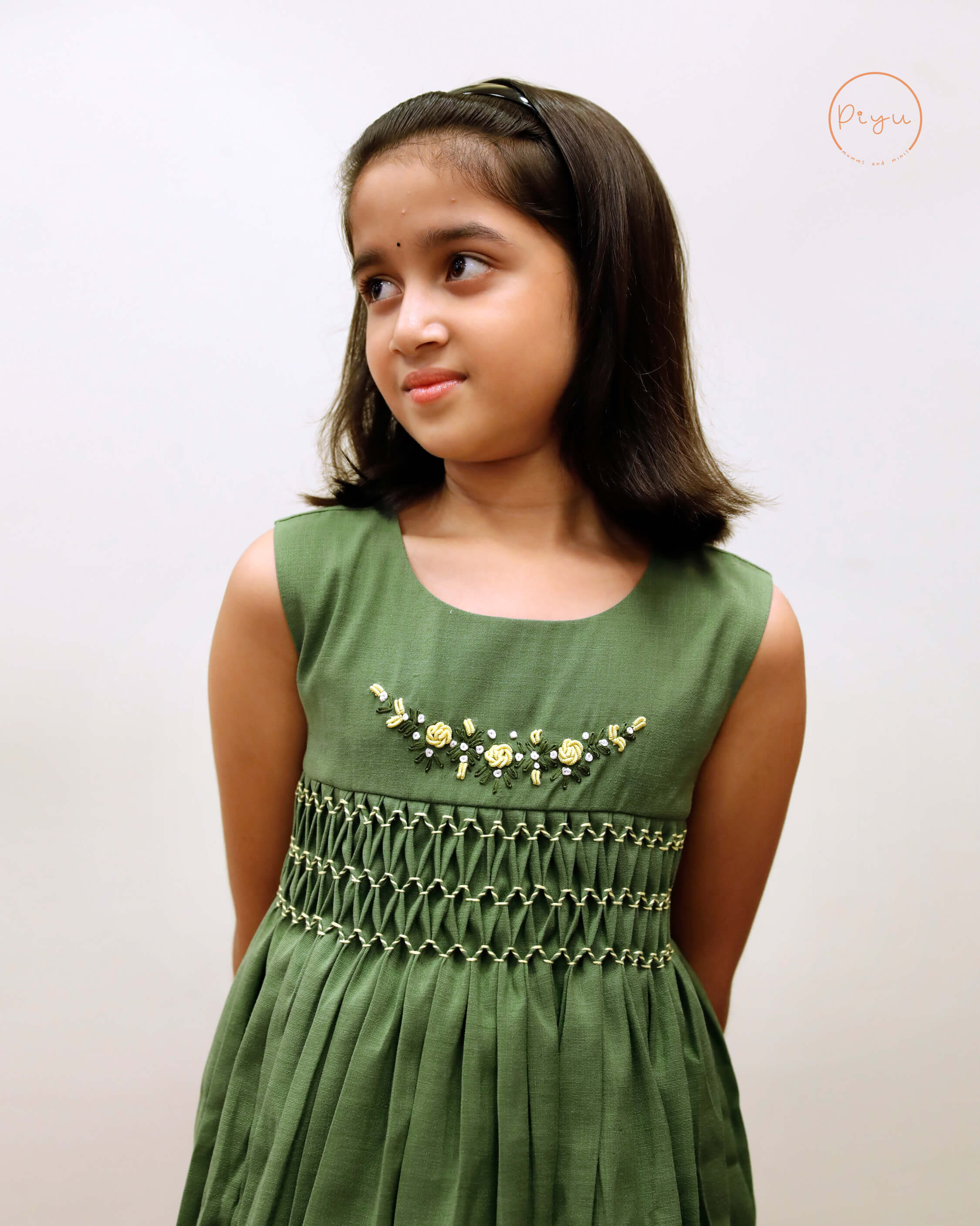 Kids Frock with smocking and hand embroidery